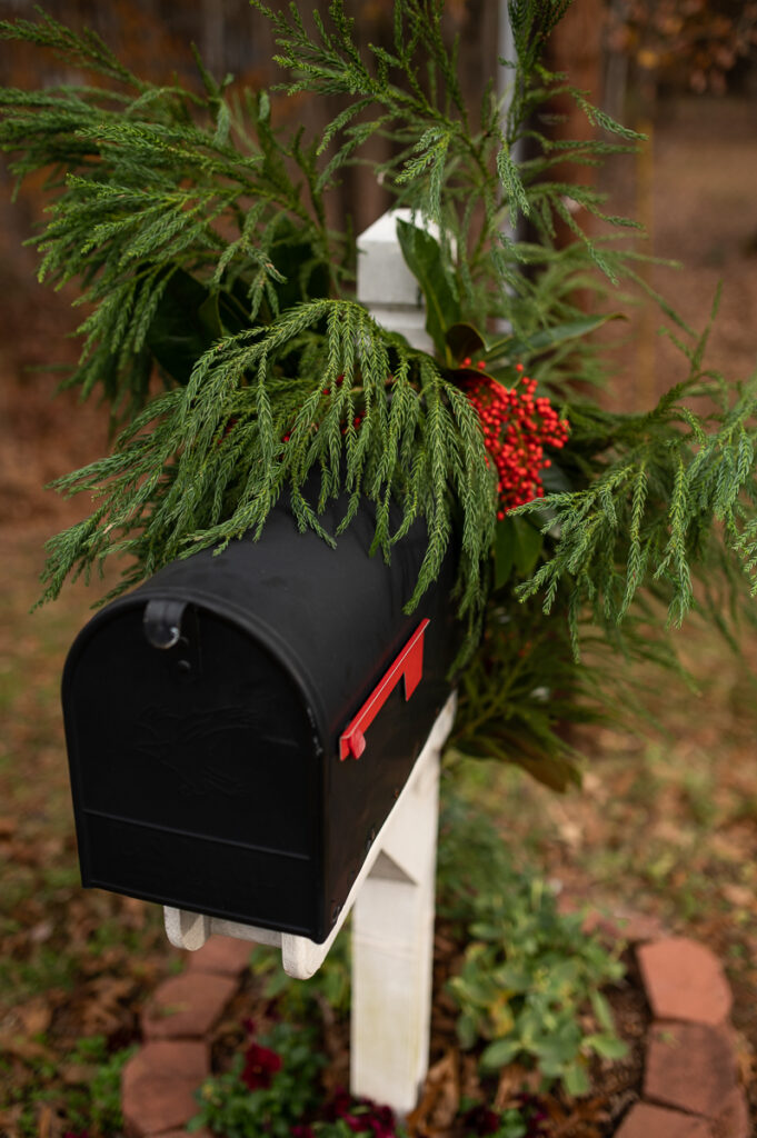 overhead view of mailbox decorated with evergreens